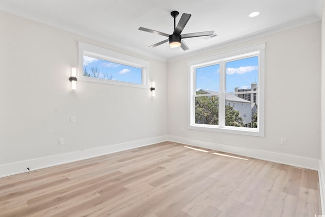 4617 Hedrick St, North Myrtle Beach, SC 29582 - empty room featuring light wood finished floors, ornamental molding, a ceiling fan, and recessed lighting