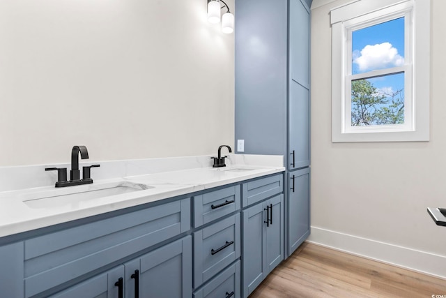 4617 Hedrick St, North Myrtle Beach, SC 29582 - full bath with wood finished floors and double vanity