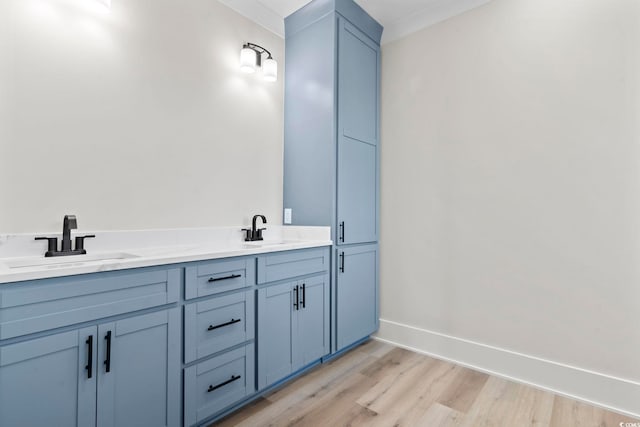 4617 Hedrick St, North Myrtle Beach, SC 29582 - bathroom with wood finished floors and double vanity