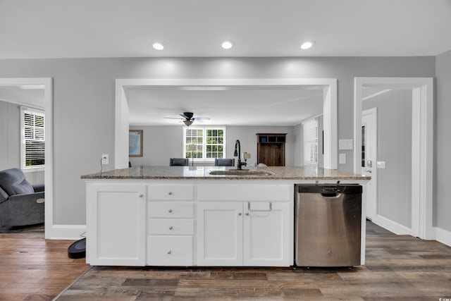 1155 Palmetto St, Georgetown, SC 29440 - kitchen with stainless steel dishwasher, open floor plan, light stone counters, dark wood-type flooring, and recessed lighting