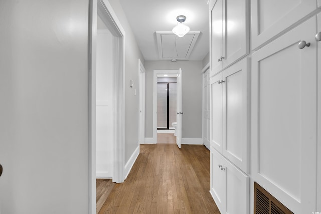 1155 Palmetto St, Georgetown, SC 29440 - hallway featuring attic access and light wood-type flooring