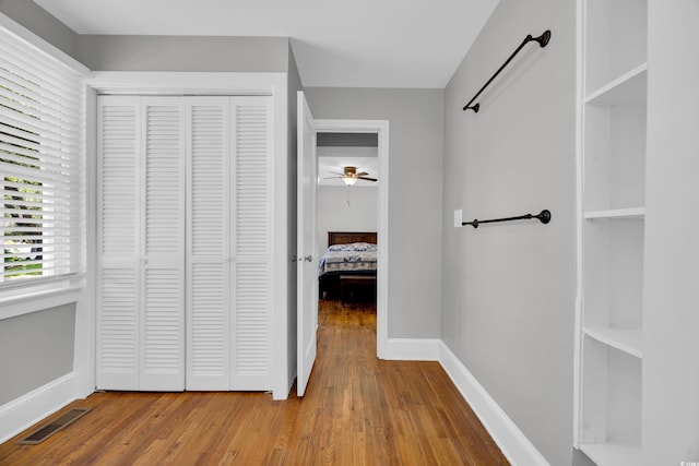 1155 Palmetto St, Georgetown, SC 29440 - hallway featuring wood finished floors and baseboards