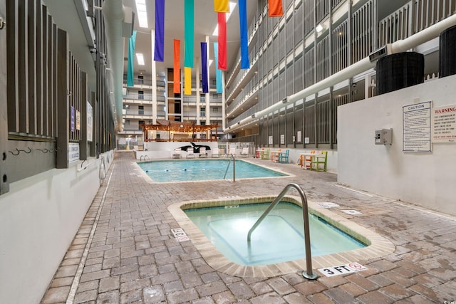 5905 S Kings Hwy Unit 242B, Myrtle Beach, SC 29575 - community pool with a community hot tub and a patio area