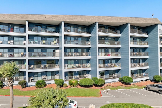 5905 S Kings Hwy Unit 242B, Myrtle Beach, SC 29575 - view of apartment building / complex featuring uncovered parking