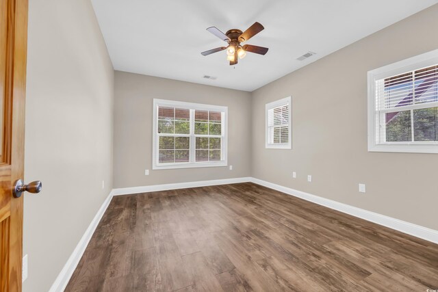 1039 Forest Dr, Conway, SC 29526 - unfurnished room featuring dark wood finished floors and ceiling fan