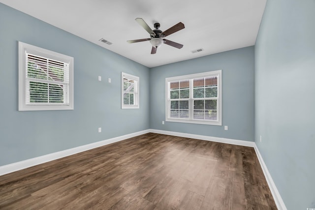 1039 Forest Dr, Conway, SC 29526 - empty room with dark wood-style flooring and ceiling fan