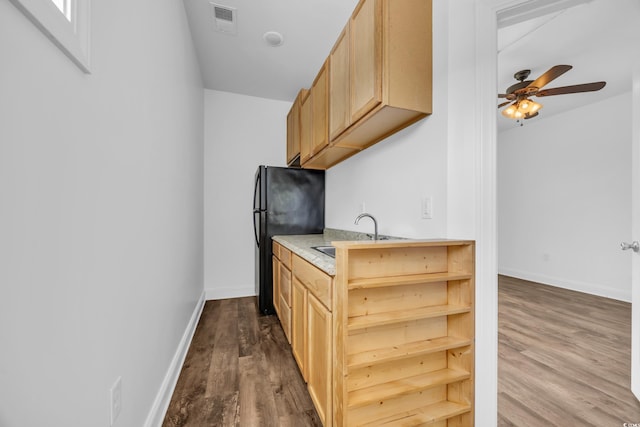 1039 Forest Dr, Conway, SC 29526 - kitchen with freestanding refrigerator, dark wood-type flooring, a ceiling fan, light countertops, and open shelves