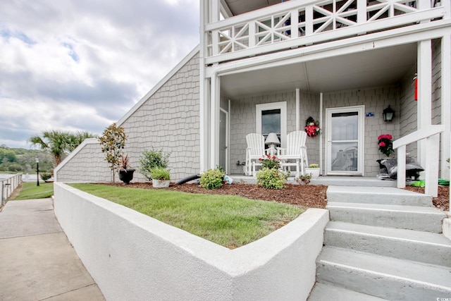 4396 Baldwin Ave Unit 1, Little River, SC 29566 - property entrance with a porch and a balcony