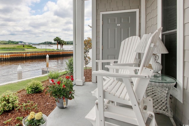 4396 Baldwin Ave Unit 1, Little River, SC 29566 - view of patio / terrace with a water view