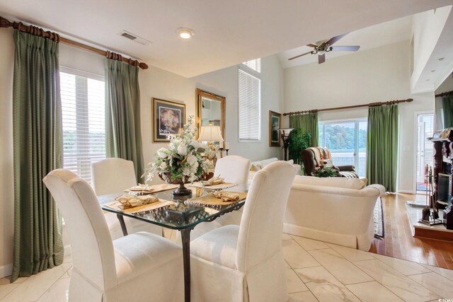 4396 Baldwin Ave Unit 1, Little River, SC 29566 - dining room with ceiling fan and wood finished floors