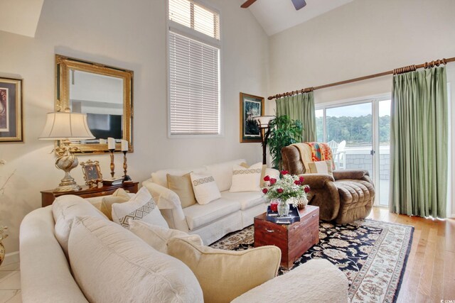 4396 Baldwin Ave Unit 1, Little River, SC 29566 - living area featuring ceiling fan, high vaulted ceiling, healthy amount of natural light, and wood finished floors