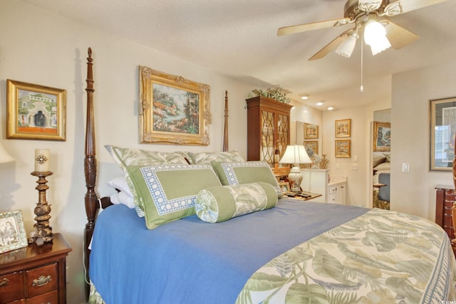 4396 Baldwin Ave Unit 1, Little River, SC 29566 - bedroom with connected bathroom and ceiling fan