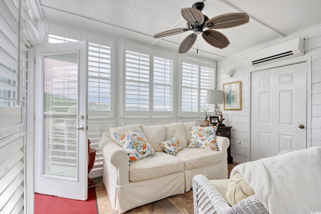 4396 Baldwin Ave Unit 1, Little River, SC 29566 - living room featuring an AC wall unit and a ceiling fan