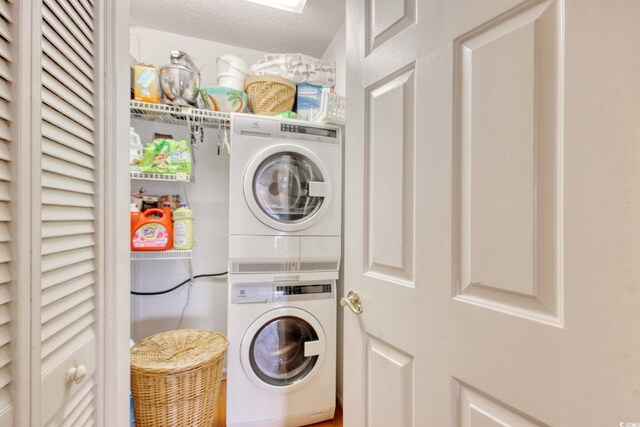 4396 Baldwin Ave Unit 1, Little River, SC 29566 - laundry room featuring stacked washer / dryer