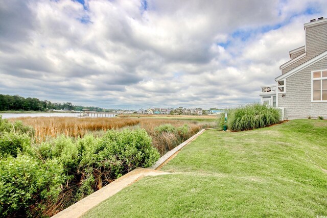 4396 Baldwin Ave Unit 1, Little River, SC 29566 - view of green lawn with a water view