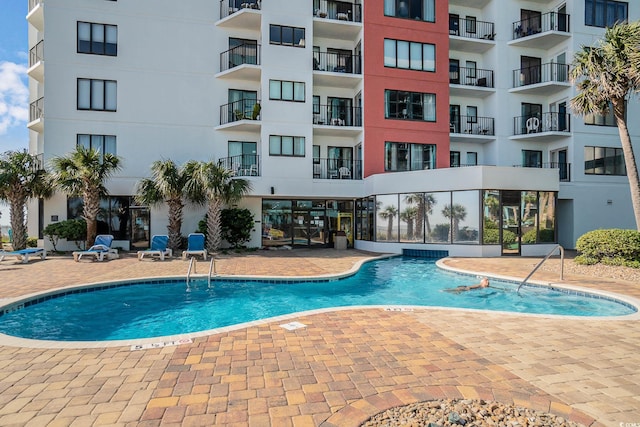 1605 S Ocean Blvd Unit 204, Myrtle Beach, SC 29577 - community pool featuring a patio area