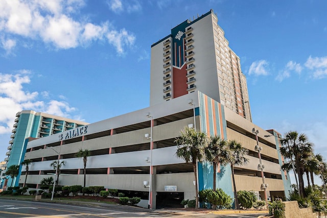 1605 S Ocean Blvd Unit 204, Myrtle Beach, SC 29577 - view of apartment building / complex with uncovered parking