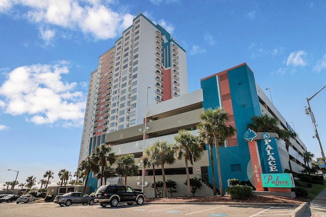 1605 S Ocean Blvd Unit 204, Myrtle Beach, SC 29577 - view of building exterior with uncovered parking