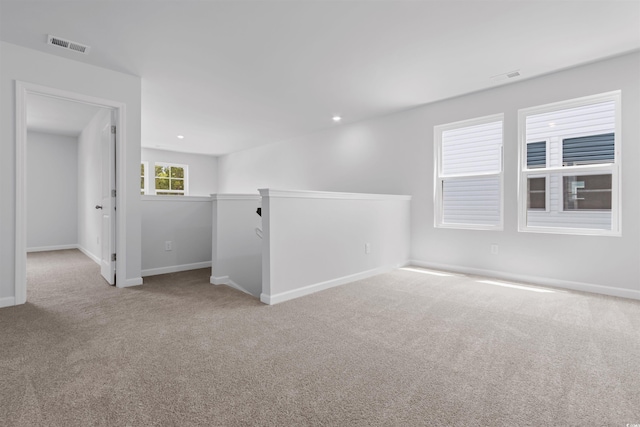 786 NW Palm Frond Way Unit 51, Calabash, NC 28467 - empty room with carpet flooring and baseboards