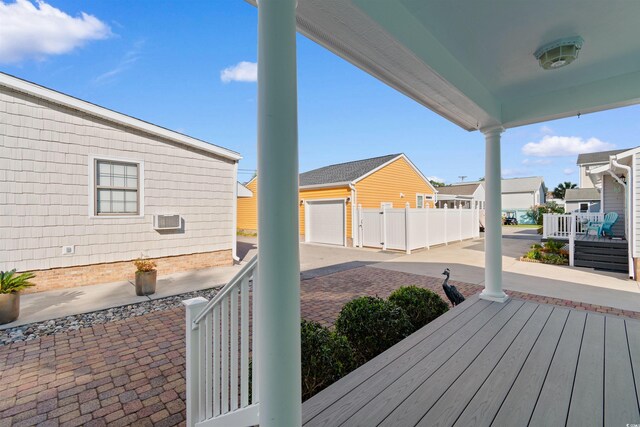 613B 3rd Ave S, North Myrtle Beach, SC 29582 - wooden terrace with a patio and a residential view
