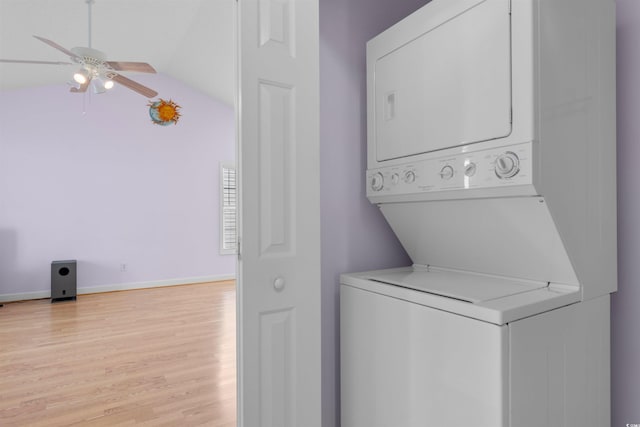613B 3rd Ave S, North Myrtle Beach, SC 29582 - laundry area with estacked washer and dryer, ceiling fan, light wood-style floors, and baseboards