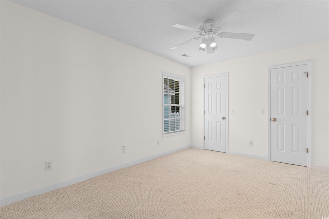 613B 3rd Ave S, North Myrtle Beach, SC 29582 - unfurnished bedroom with carpet floors, baseboards, and ceiling fan