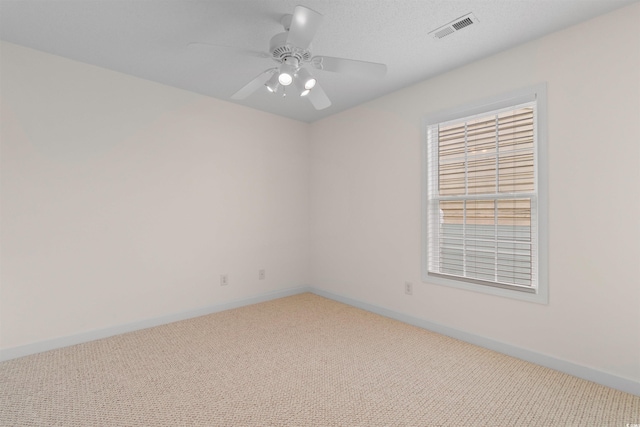 613B 3rd Ave S, North Myrtle Beach, SC 29582 - unfurnished room featuring light carpet, baseboards, and ceiling fan
