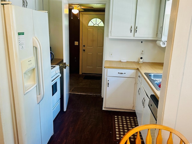 8 Raymond St, Andrews, SC 29510 - kitchen with white appliances, a sink, white cabinetry, and dark wood-type flooring