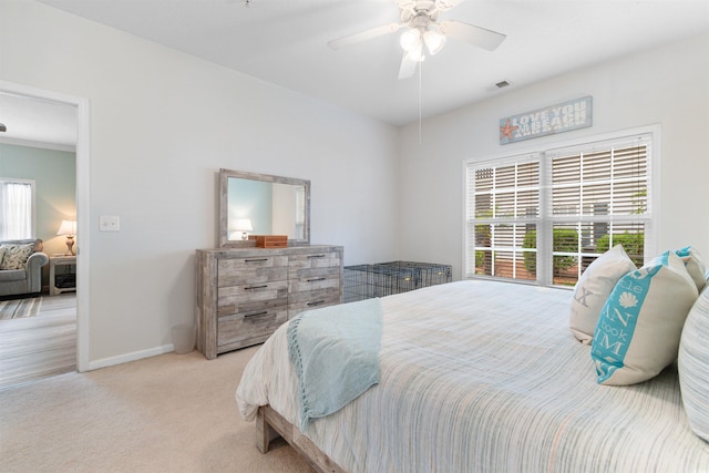 411 Mahogany Dr Unit 101, Murrells Inlet, SC 29576 - carpeted bedroom featuring baseboards and a ceiling fan