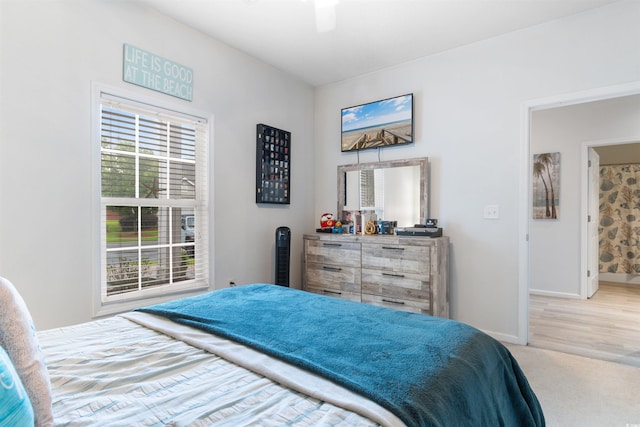 411 Mahogany Dr Unit 101, Murrells Inlet, SC 29576 - carpeted bedroom featuring baseboards and a ceiling fan