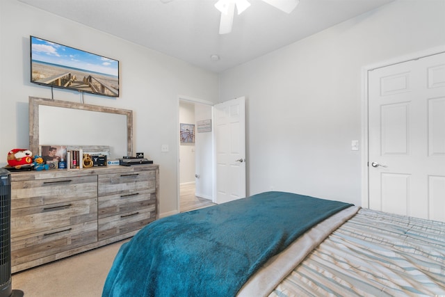 411 Mahogany Dr Unit 101, Murrells Inlet, SC 29576 - bedroom featuring a ceiling fan and light carpet