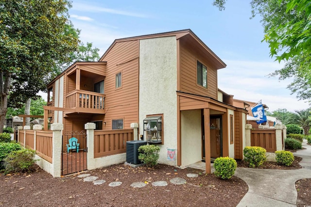 614 15th Ave S Unit 41, Surfside Beach, SC 29575 - view of side of home featuring a balcony and stucco siding