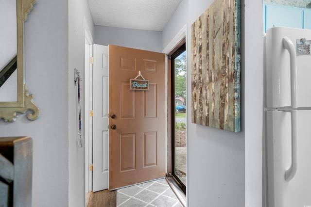 614 15th Ave S Unit 41, Surfside Beach, SC 29575 - entryway featuring a textured ceiling