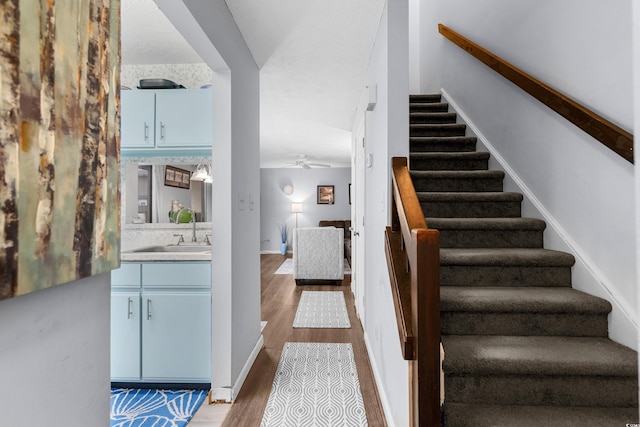 614 15th Ave S Unit 41, Surfside Beach, SC 29575 - staircase featuring wood finished floors and ceiling fan