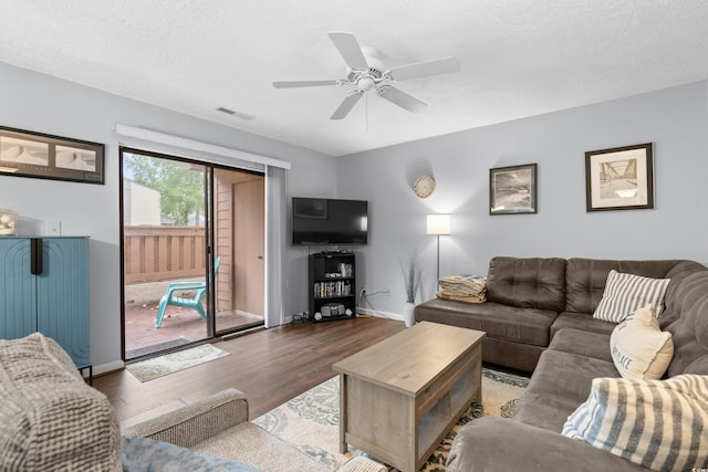 614 15th Ave S Unit 41, Surfside Beach, SC 29575 - living room featuring wood finished floors, a ceiling fan, and a textured ceiling
