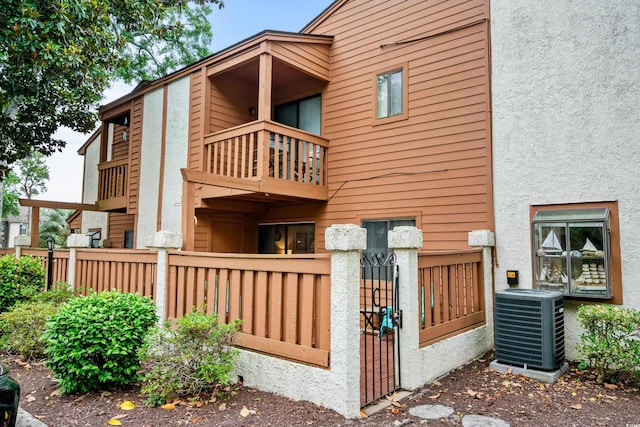 614 15th Ave S Unit 41, Surfside Beach, SC 29575 - back of house with a balcony and stucco siding