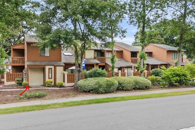 614 15th Ave S Unit 41, Surfside Beach, SC 29575 - townhome / multi-family property featuring a residential view, stucco siding, and a shingled roof