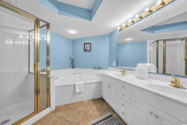 135 S Dunes Dr Unit 501, Pawleys Island, SC 29585 - full bathroom with double vanity, a shower stall, a garden tub, and tile patterned floors