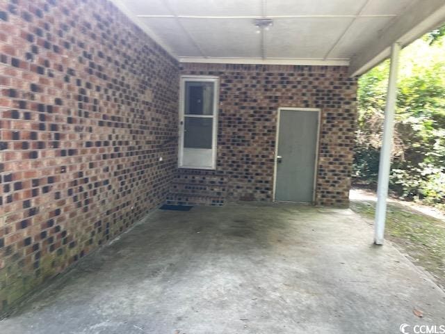 41 Harmon St, Hemingway, SC 29554 - view of patio featuring entry steps