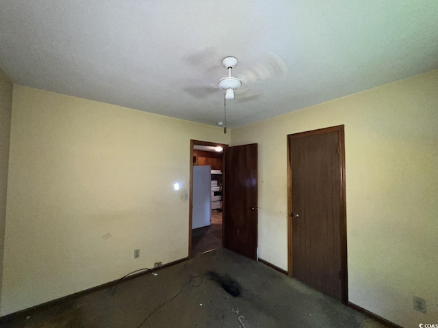 41 Harmon St, Hemingway, SC 29554 - unfurnished bedroom featuring baseboards and ceiling fan