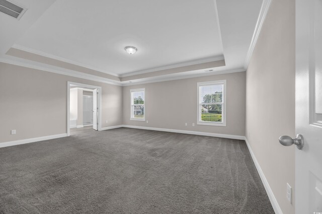 5621 Camilla Ct, Myrtle Beach, SC 29579 - unfurnished room with a tray ceiling, crown molding, dark carpet, and baseboards