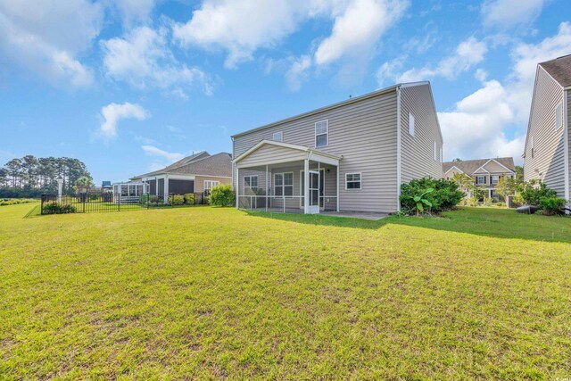 5621 Camilla Ct, Myrtle Beach, SC 29579 - rear view of house featuring a sunroom