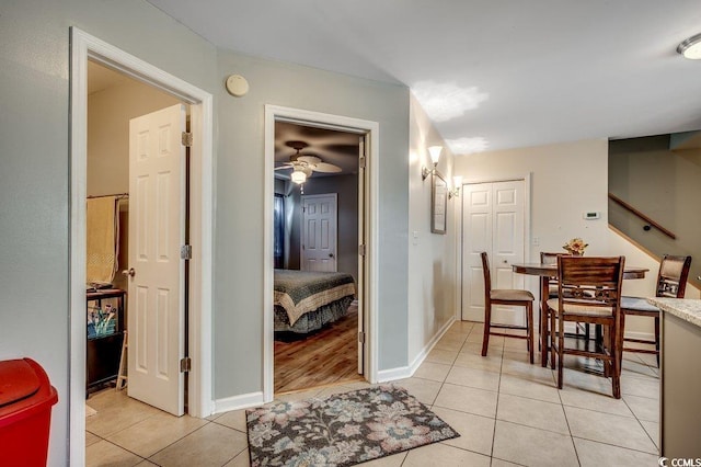 403 Chesterfield Ct, Myrtle Beach, SC 29577 - hall with light tile patterned floors, baseboards, and stairs