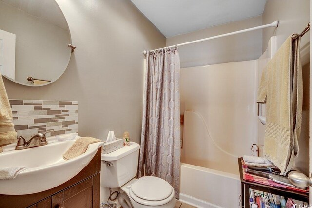 403 Chesterfield Ct, Myrtle Beach, SC 29577 - bathroom featuring decorative backsplash, vanity, shower / tub combo, and toilet