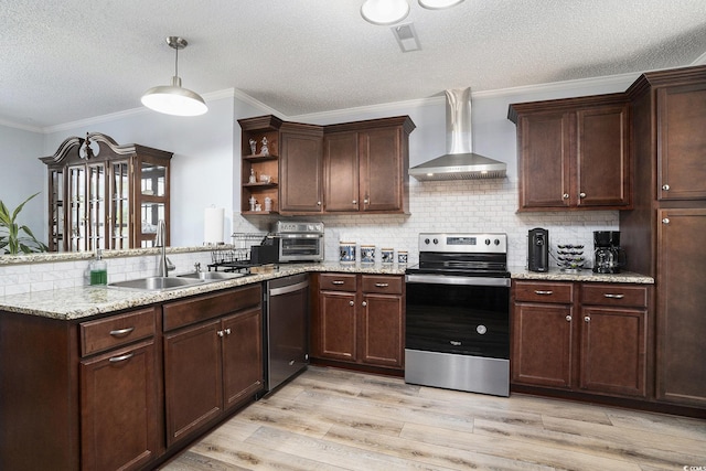 2981 Victor Rd, Longs, SC 29568 - kitchen with appliances with stainless steel finishes, wall chimney range hood, a sink, open shelves, and a peninsula