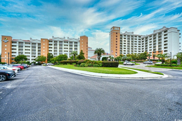 8121 Amalfi Pl Unit 7-805, Myrtle Beach, SC 29572 - view of apartment building / complex featuring uncovered parking