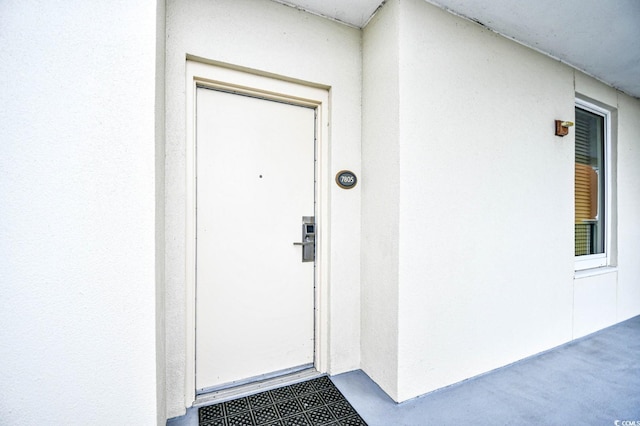 8121 Amalfi Pl Unit 7-805, Myrtle Beach, SC 29572 - doorway to property with stucco siding