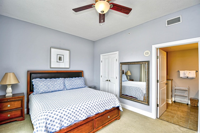 8121 Amalfi Pl Unit 7-805, Myrtle Beach, SC 29572 - bedroom featuring a closet, light colored carpet, baseboards, and ceiling fan