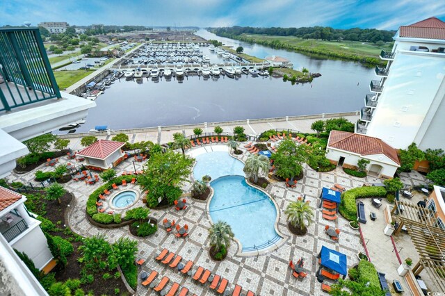 8121 Amalfi Pl Unit 7-805, Myrtle Beach, SC 29572 - drone / aerial view of a nearby body of water and a pool area