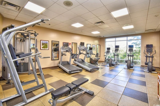 8121 Amalfi Pl Unit 7-805, Myrtle Beach, SC 29572 - gym featuring a paneled ceiling and baseboards